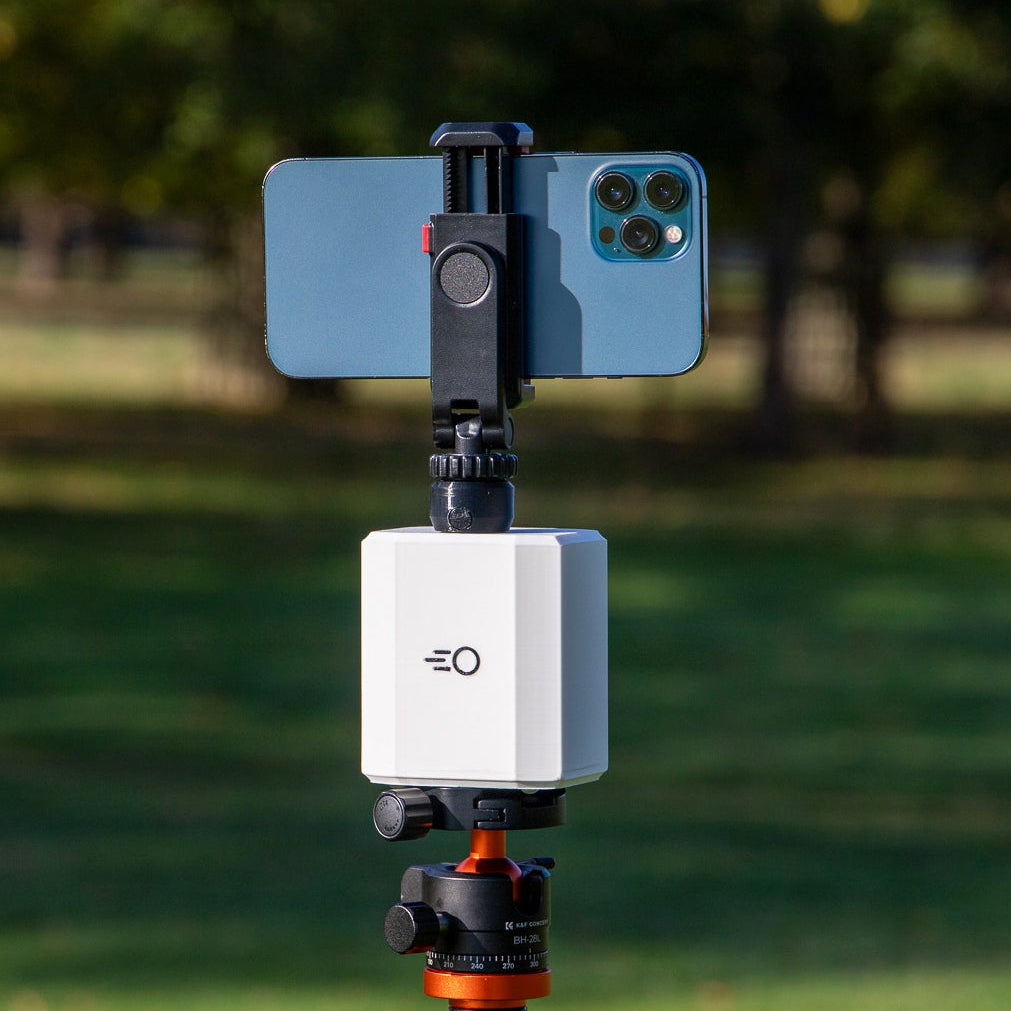 Pitchwise Mount on a tripod with a phone mount in a park setting